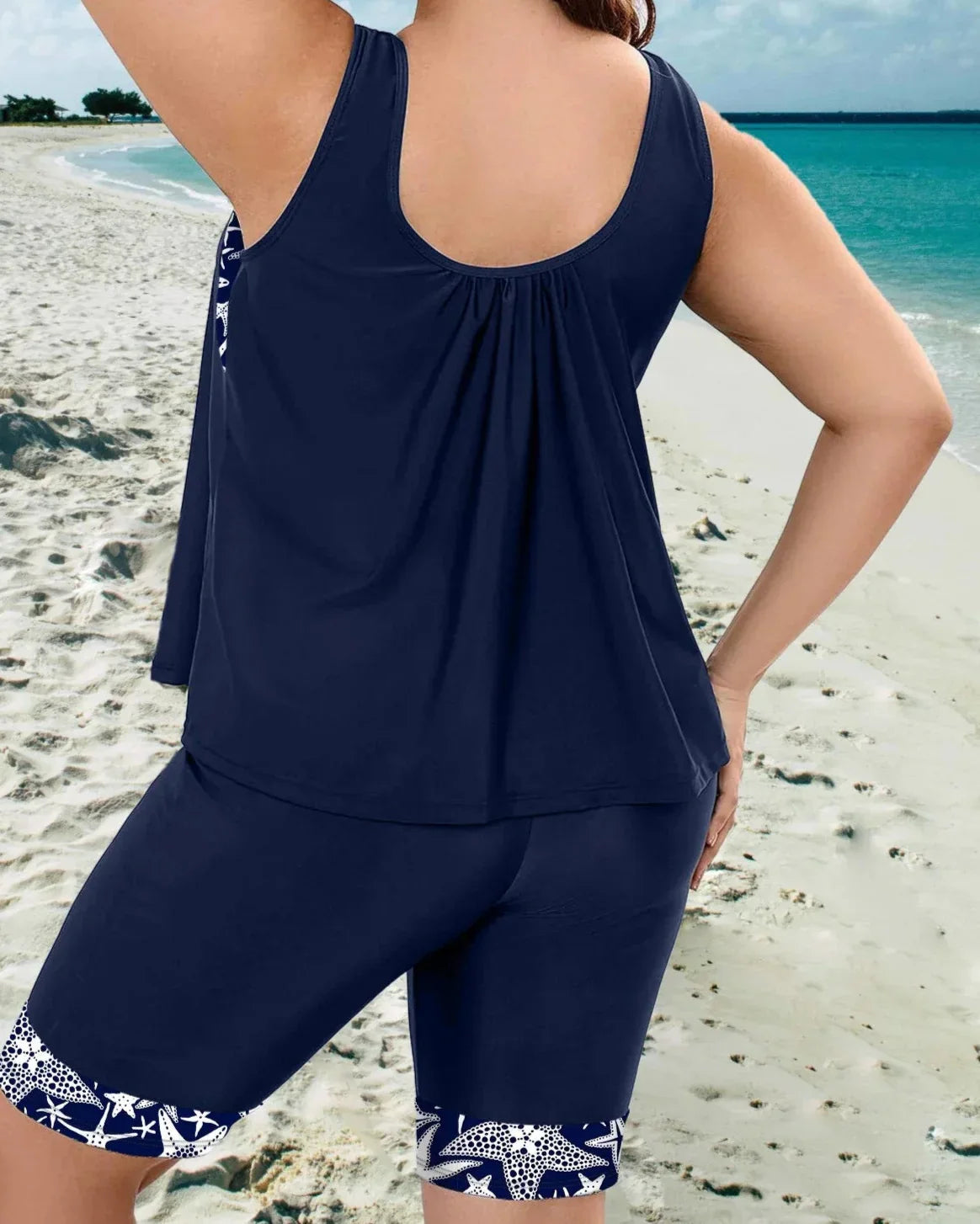 Tankini top and mid-thigh shorts